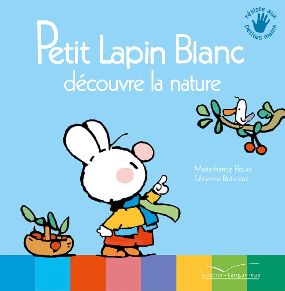Petit lapin blanc découvre la nature